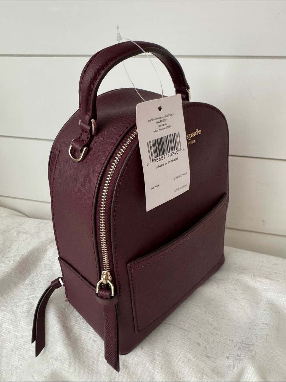 Kate Spade Cameron Mini Convertible Leather Backpack in the color cherrywood - Picture 7 of 11